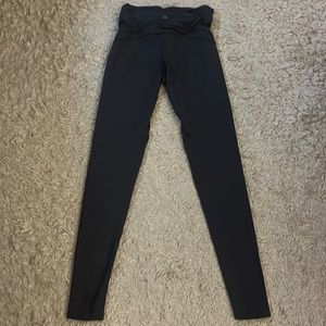small grey leggings with lower leg designs